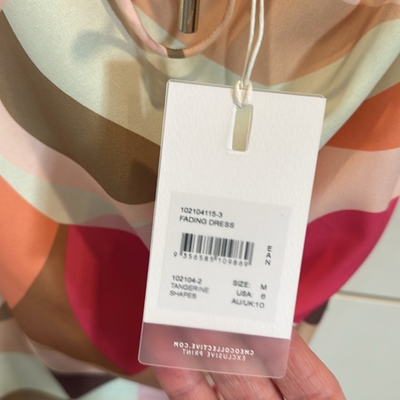 Cocktail dress. NWT. Unique cut and angles. So flattering. - Picture 6 of 7